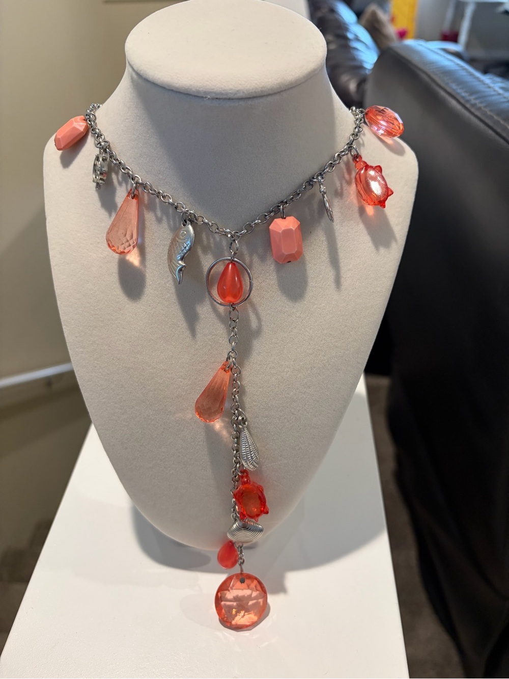 Pink and silver colored necklace
